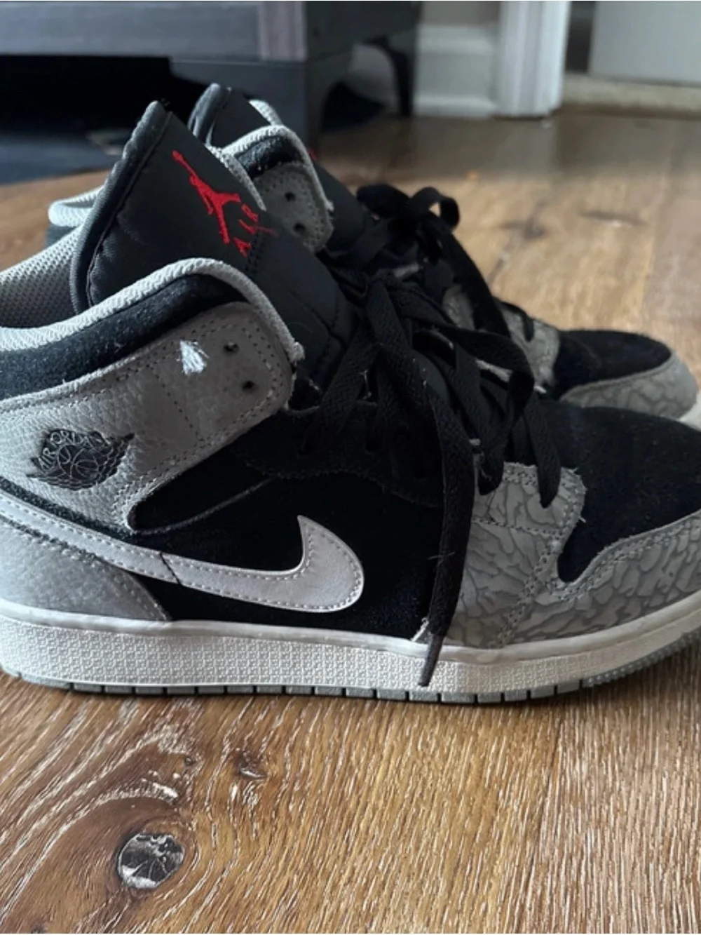 Jordan Black, Gray, and Red High-Top Sneakers